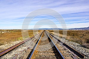 Railroad tracks across marshland, Alviso, San Jose, south San Francisco bay area, California