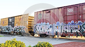 Graffi on a traveling train cargo box