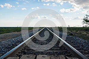 Railroad tracks converging