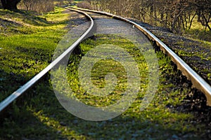 Railroad tracks going around the corner