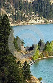 Railroad tracks on lake shore