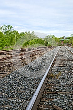 Railroad tracks leading into town