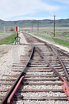 Railroad tracks merging at switch