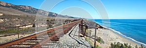 Railroad tracks over bridge at Gaviota Beach on the central coast of California USA photo