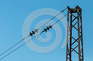Railroad tracks with railway electrification system. Overhead line wire over rail track. Power lines. Vintage image