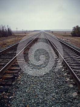 Railroad tracks in the steppe. Railway in the Russian steppe.