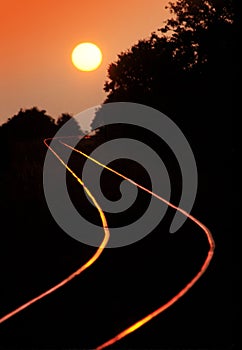 Railroad tracks in sunset