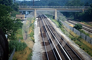 Railroad trackswith a bridge over the tracks