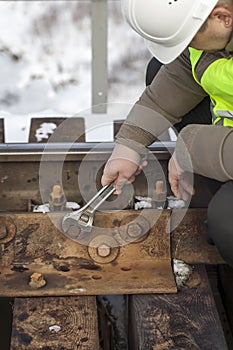 Railroad worker with wrench