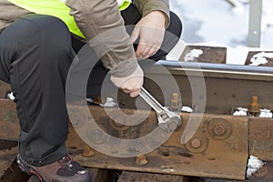 Railroad worker with wrench