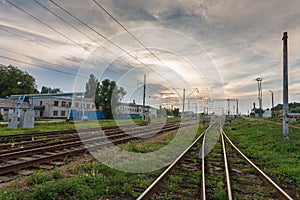 Railroads against beautiful sky at sunset.