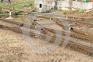 The rails and the arrow for the railway, the fork of the road.