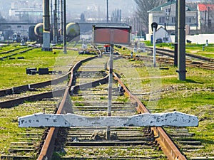 Rails of a blocked railway with prohibitory sign