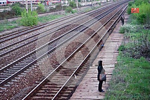 Rails and coumuters in Carpati station, Bucharest