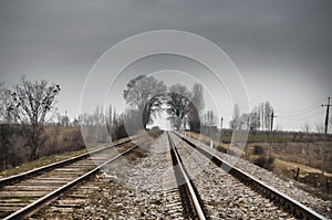 Rails (dormitories) at the electrified railway corridor. Cloudy weather. Gazakh Azerbaijan