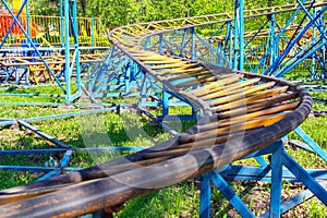 The rails of a roller coaster in an amusement park