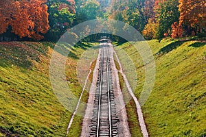 Railway in autumn forest