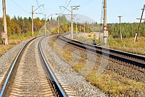 Railway in autumn forest