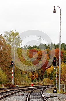 Railway in the autumn with semaphores