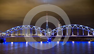 Railway bridge at night in Riga