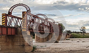 Railway bridge over a dried river in Africa