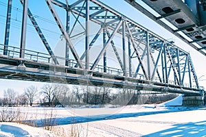 Railway bridge over the frozen river