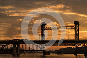 Railway bridge over river at sunset. Beautiful landscape