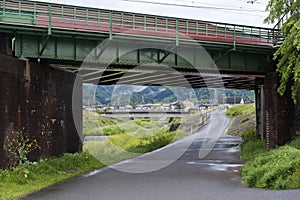 Railway bridge over Uno River in Kameoka, Japan