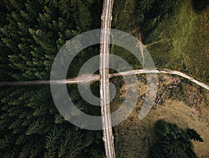 Railway bridge - Viaduct of Telgart in Europe Slovakia from above top view with beautiful pine forest and path under the viaduct