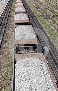 Railway carriage loaded with gravel.