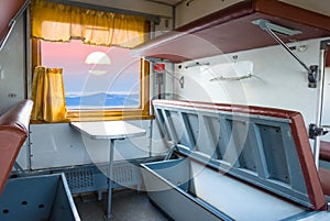 Railway carriage with mountain view from window