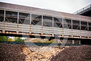 Railway carriage riding on railways under the bridge