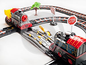 Railway for children to play, locomotives on a motor with batteries, railway tracks, signs, playing