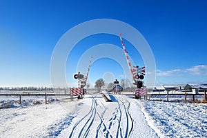 Railway crossing in winter