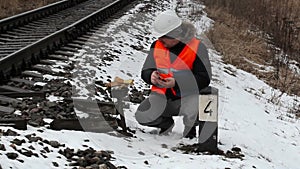 Railway employee checked the signal relays