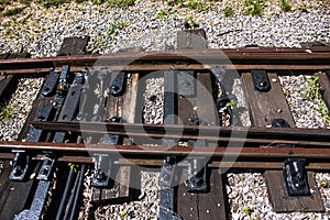 Railway equipment. Installation of rail fastening. Railway turnout mechanism. Filming of the Soviet-era children`s railway in the