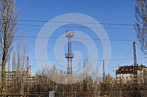 Railway facilities and electrical network with iron poles and wires of the old station Poduyane, built 1930 now under renovation