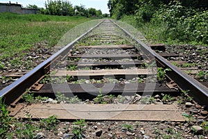 Railway through a forest in the countryside