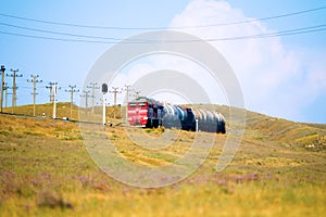 Railway freight train with tank cars