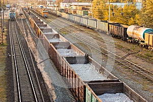 Railway. Freight wagons carrying different loads. Heavy industry concept