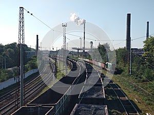 Railway. Freight wagons carrying different loads. Heavy industry concept