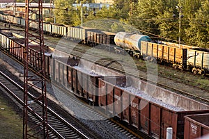 Railway. Freight wagons carrying different loads. Heavy industry concept