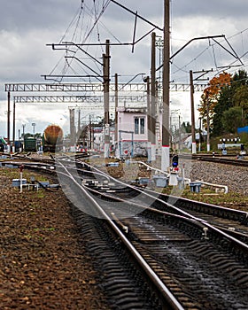 Railway with freight wagons and cisserines on it