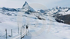 Railway going to Gornergrat train station under breathtaking Matterhorn, Zermatt