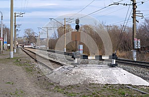 Railway impasse on the railroad tracks on the spring in Sunny weather photo