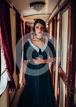 Railway journey woman in vintage train compartment