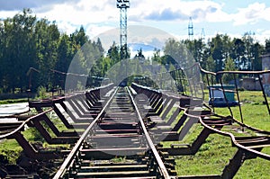 Railway landscape. Old worn railway tracks.