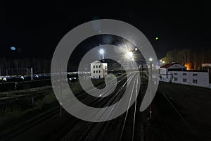 Railway and light lanterns in a night