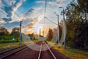 Railway line in the city at sunset. Siemianowice ÅšlÄ…skie, Poland