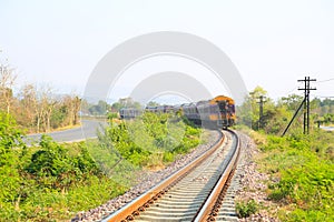 Railway line passing through the green plants. Journey way by train